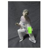 Lladro clown on knee