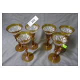 Six amber etched wine glasses
