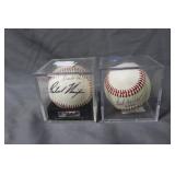 Two autohgraphed baseballs