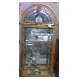 Oak arch top showcase, 6 shelves, lighted, access