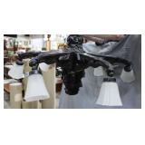 Six arm Gargoyle chandelier with frosted globes