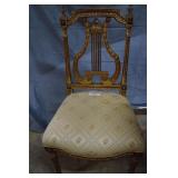 Boudoir chair, gold gilt with harp design back