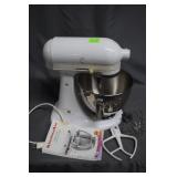 White Kitchen Aide mixer with two standard