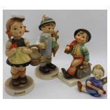 Four Hummel figures: boy with guitar, Merry