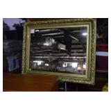 Large wood carved tinted mirror in gold guild 41"