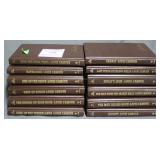 12 Western leather bound texts by Louis L