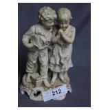 Bisque figure of boy & girl