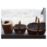 Three Longaberger baskets: two oval handled Easter