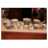 Silver rimmed white dinnerware service for 12 CP G