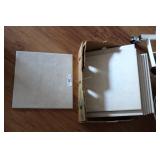 Eight neutral tone floor tiles