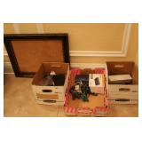 Three boxes office supplies & corkboard in frame