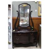 Bow front two over one claw foot dresser with