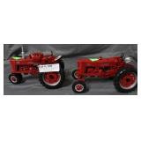 Two Farmall 400 Model tractors
