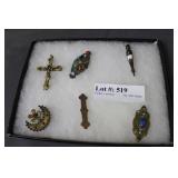 Six antique brooches: Cross, floral, gemstone