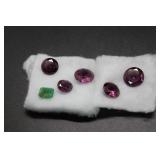 Five precious gemstones: emerald & amethyst(?)