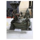 Heavy bronze deity figure