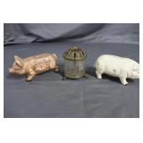 Three contemporary cast iron banks: pigs &