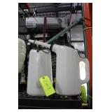 Two 8 quart spouted liquid delivery containers