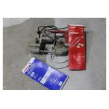 Milwaukee portable band saw with extra blades