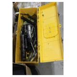 Five grease guns in yellow plastic tool box