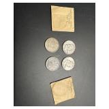 Two Benjamin Franklin Half Dollars: 1953, 1958