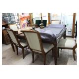 Dining room table with 6 chairs, two leaves