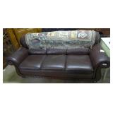 Full sized oxblood sofaSwirl wood arms& lower