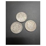 Three Morgan Dollars: 1882, 1890, 1921