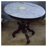Oval Marble top end table, decorative apron,
