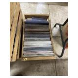 Wooden crate loaded with records