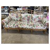 Maple framed  spindled camel back sofa with