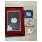 One 1971 Eisenhower Dollar & Three Morgan Head