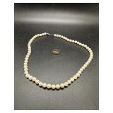 A Pearl Necklace and a baby ring