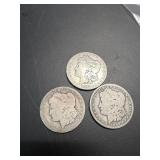 Three Morgan Dollars: 1882, 1886, 1899