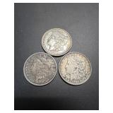 Three Morgan Dollars: 1884, 1887, 1921
