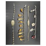 Two Charm Bracelets and Two Bracelets (one says