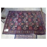 Middle Eastern hand knotted area rug, red