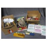 Tie-a-fly, feathers, measuring tools, bobbers,