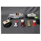 Eight model cars - some with damage - Ertl,