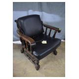Wood frame arm chair w/ black vinyl cushions,