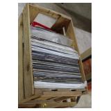 Wooden crate loaded with records