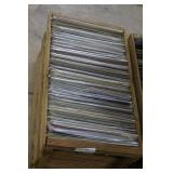 Wooden crate loaded with records