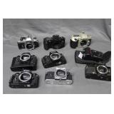 Nine Nikon cameras - FG, N60, Coolpix 700, Canon