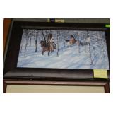 Native American framed print riding through snow