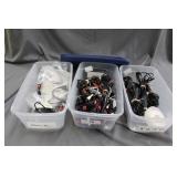 3 plastic totes loaded with video/audio cables wit