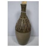 Narrow upright hand thrown ceramic vase