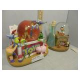 Two Disney snowglobes - Toy Story & Pinocchio