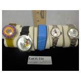 Four Disney wrist watches & Magic band