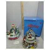 Two Disney snowglobes 2003 Happy Holidays &
