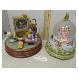 Two Disney snow globes- It